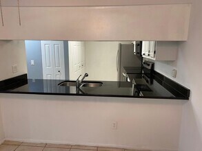 654 Kenwick Cir, Unit 103 in Casselberry, FL - Building Photo - Building Photo