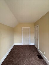 1056 Walnut St in Elmira, NY - Building Photo - Building Photo