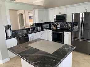 7891 Manor Forest Blvd in Boynton Beach, FL - Foto de edificio - Building Photo