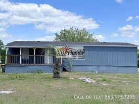 1732 W Holiday Dr in Lorida, FL - Building Photo