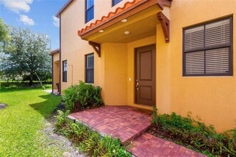 4855 NW 55th Pl in Tamarac, FL - Building Photo - Building Photo