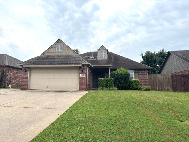 property at 20250 East 33rd St S