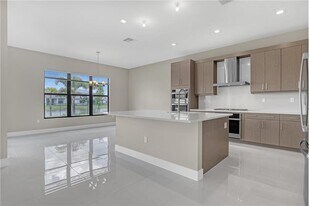 10033 Heron Flock Dr in Palm Beach Gardens, FL - Building Photo