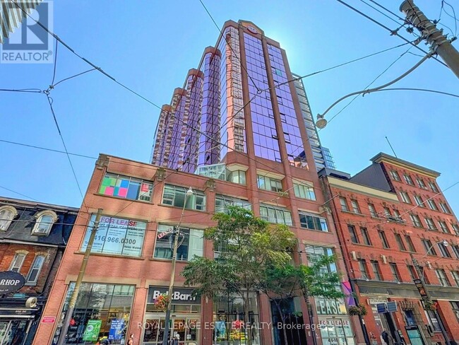 property at 393-393 King St W
