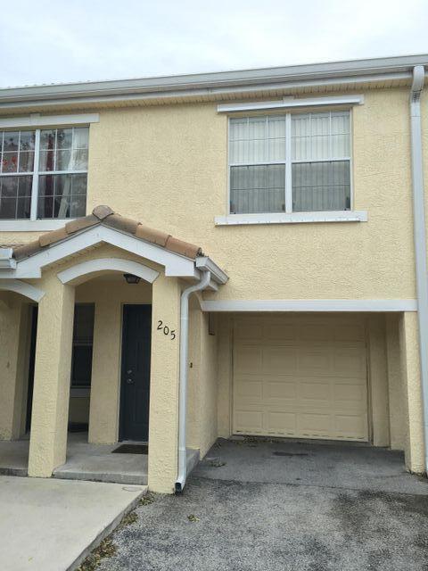 124 SW Peacock Blvd in Port St. Lucie, FL - Building Photo