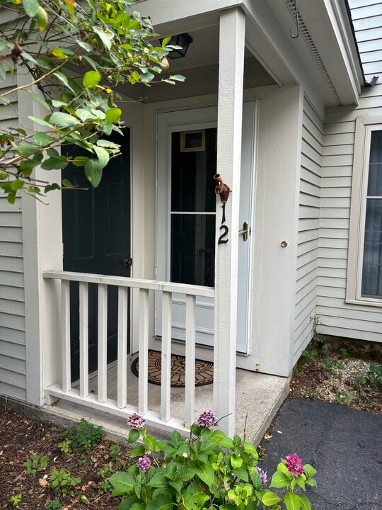 12 Woodland Green in Rochester, NH - Building Photo