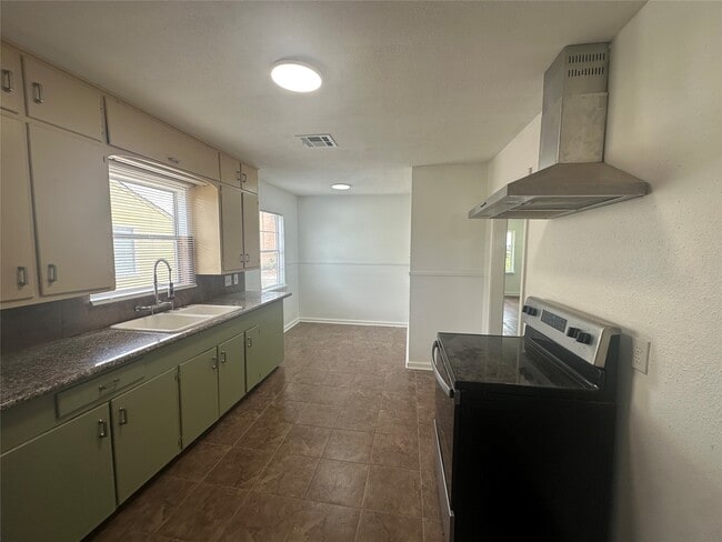 property at 3444 Blodgett St