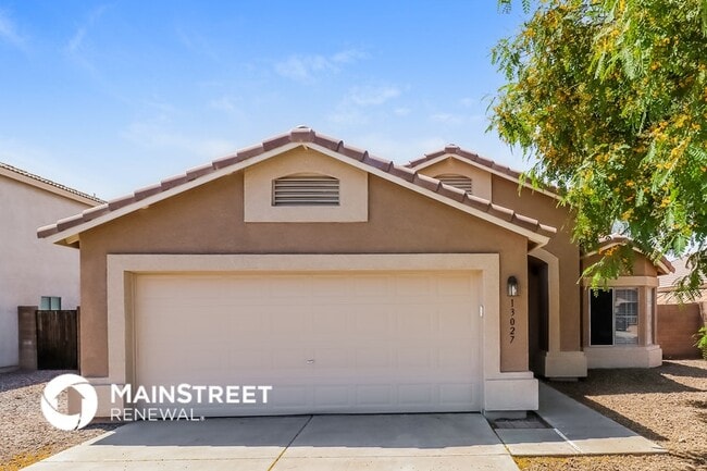 property at 13027 W Surrey Ave