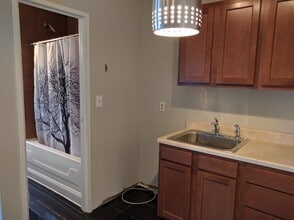 1001 St Paul St, Unit 10E in Baltimore, MD - Foto de edificio - Building Photo