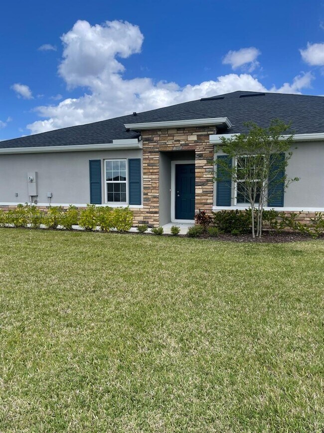 9509 SW Libertas Wy in Port St. Lucie, FL - Building Photo - Building Photo