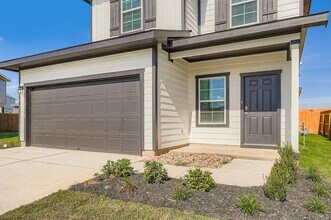 12112 Douglas Fir Cir in Mustang Ridge, TX - Building Photo - Building Photo