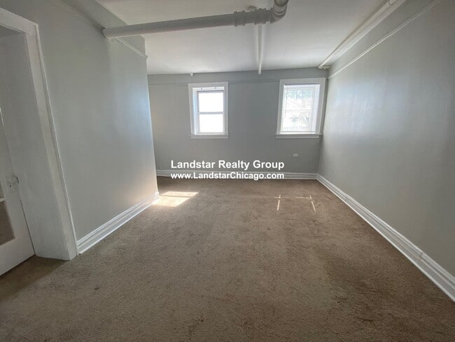 1053 W Pratt Blvd, Unit G in Chicago, IL - Foto de edificio - Building Photo