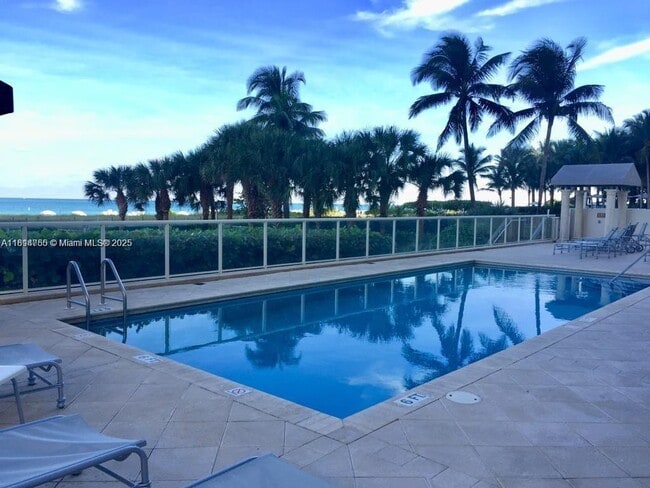 property at 9499 Collins Ave