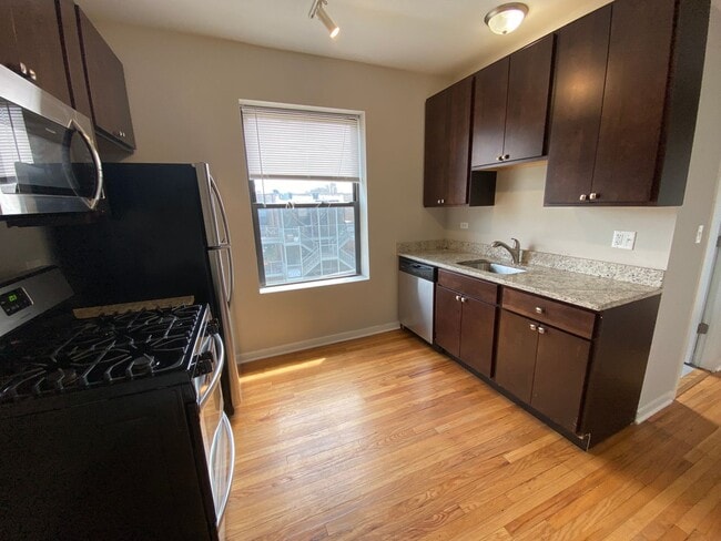 4817 N Christiana Ave, Unit 1W in Chicago, IL - Foto de edificio - Building Photo