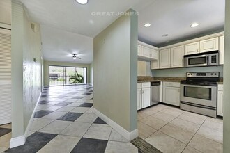 1220 Commonwealth Cir-Unit -# M-204 in Naples, FL - Building Photo - Building Photo