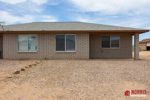 9874 W Leander Dr in Arizona City, AZ - Building Photo