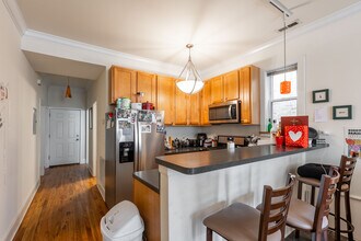 1314 W Roscoe St, Unit 1 in Chicago, IL - Foto de edificio - Building Photo