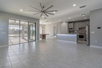 6775 Winding Cypress Dr in Naples, FL - Building Photo - Building Photo