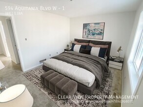 594 Aquitania Blvd W in Lethbridge, AB - Building Photo - Building Photo