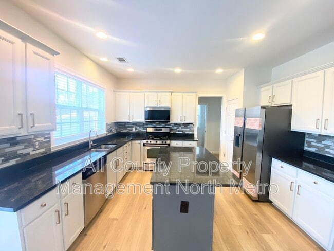 4440 Azurite St in Cumming, GA - Building Photo - Building Photo