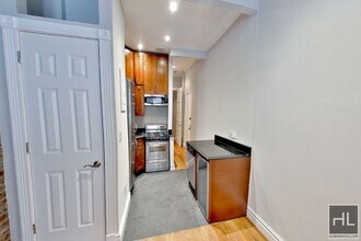 Perry Street in New York, NY - Building Photo - Building Photo