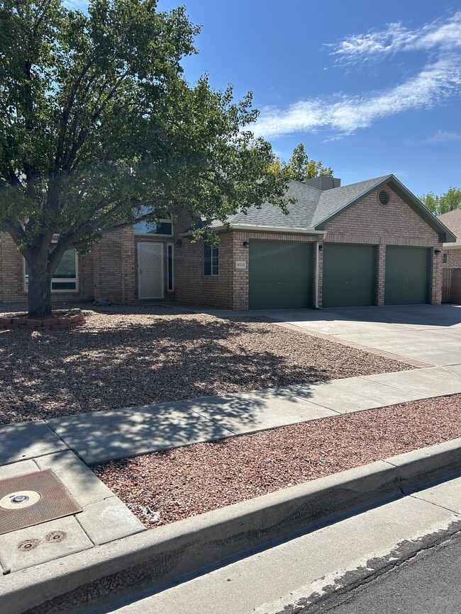 property at 8316 Calle Primera NW