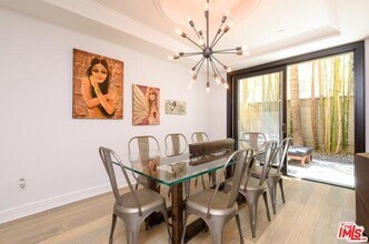 411 N Oakhurst Dr in Beverly Hills, CA - Building Photo - Building Photo