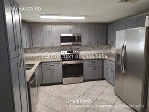 5700 Baker Rd in New Port Richey, FL - Building Photo - Building Photo