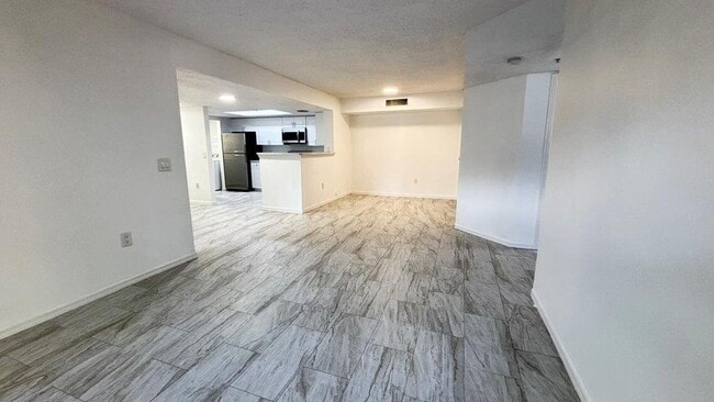 5025 Wiles Rd in Coconut Creek, FL - Building Photo - Building Photo