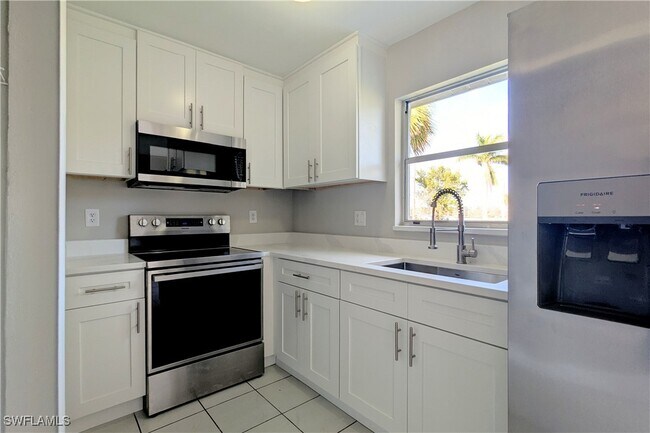 property at 431 NE Pine Island Ln