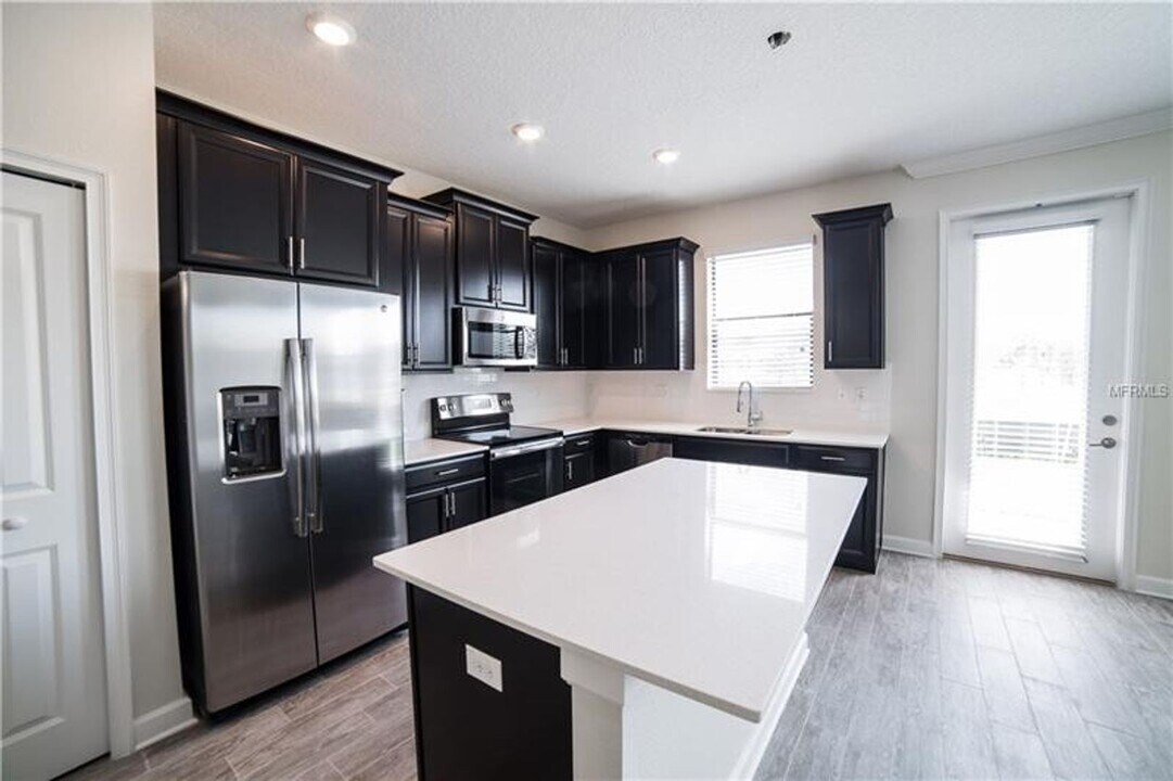 1225 Payne Stewart Dr in Davenport, FL - Building Photo