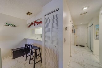 2725 Countryside Blvd, Unit Building 1-230 in Clearwater, FL - Building Photo - Building Photo