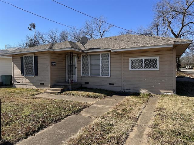 1234 N Travis St in Sherman, TX - Building Photo