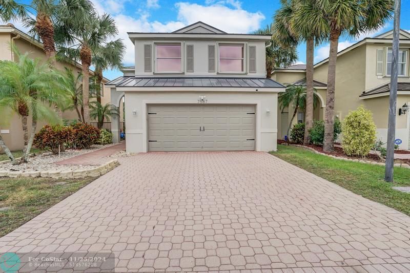 7587 Sierra Ridge Ln in Greenacres, FL - Foto de edificio