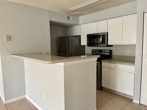 2213 Grand Cayman Ct, Unit 1121 in Kissimmee, FL - Building Photo - Building Photo