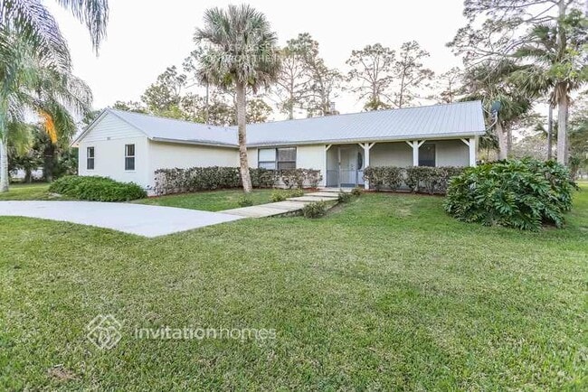 5241 110th Ave N in West Palm Beach, FL - Foto de edificio - Building Photo