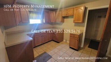 2107 Plymouth Dr in Uniontown, OH - Building Photo - Building Photo