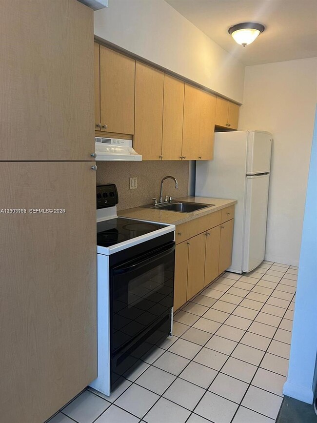 property at 12605 NE 13th Ave