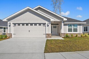 571 Riverwalk Cir in Freeport, FL - Building Photo