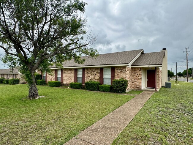 property at 9114 Woodgate Cir E