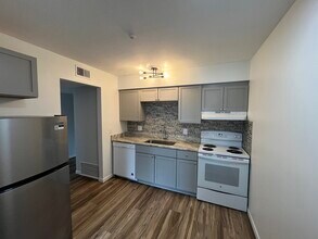 77 Atterbury Blvd, Unit 313 in Hudson, OH - Foto de edificio - Building Photo