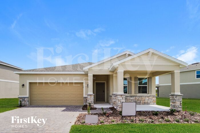 1229 Spokane Pt in Kissimmee, FL - Foto de edificio
