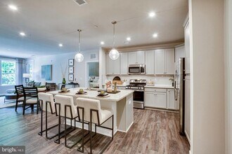 21731 Dovekie Ter, Unit 403 in Ashburn, VA - Building Photo - Building Photo