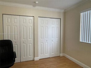 8771 NW 106th Ln, Unit A0320 in Hialeah, FL - Foto de edificio - Building Photo