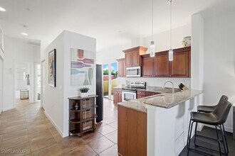 22300 Piazza Doria Ln in Estero, FL - Building Photo - Building Photo