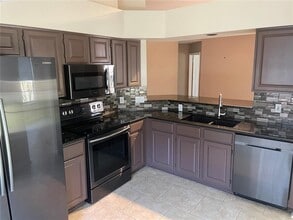 7701 Carriage Homes Dr in Orlando, FL - Building Photo - Building Photo