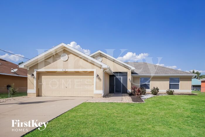 414 Willowbrook Dr in Lehigh Acres, FL - Building Photo