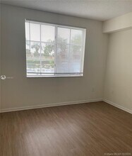 7940 N Nob Hill Rd-Unit -107 in Tamarac, FL - Building Photo - Building Photo