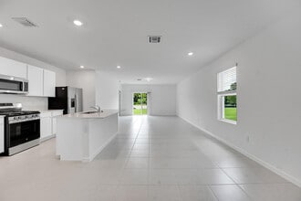 5908 NW Fairfax Ave in Port St. Lucie, FL - Building Photo - Building Photo
