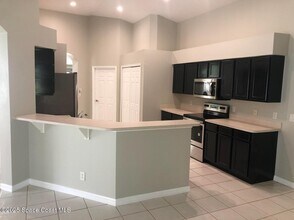 2061 12 Oaks Dr SE in Palm Bay, FL - Building Photo - Building Photo